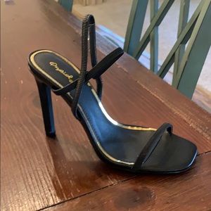 Never worn black heels